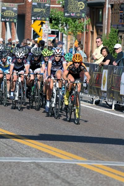 An Optum rider leads out the women's field