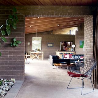 Living room with brick walls and sofa set