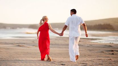 People on beach, Standing, People in nature, Coastal and oceanic landforms, Dress, Summer, Interaction, Beach, Vacation, Holiday, 