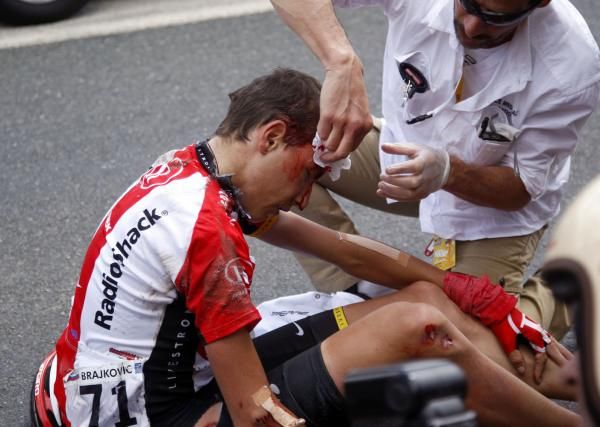 Janez Brajkovic is treated by the race doctor
