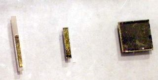 Closeup look at Intel's prototype on-chip lasers. The bars on the left have 25 lasers while the right has 1000.