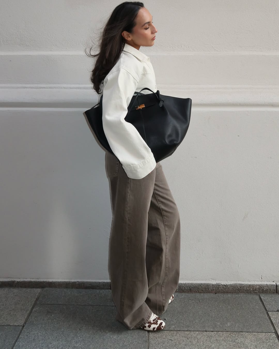 Ingrid in a collared white blouse