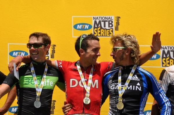 The elite men's podium: David George (360 life), Max Knox (DCM) and Mannie Heymans (Garmin)