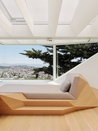 geometric day bed in san francisco home office with window above