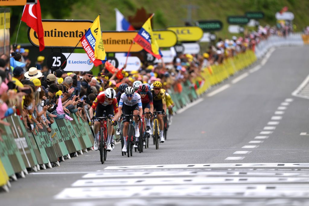 LARUNS FRANCE JULY 05 Tadej Pogacar of Slovenia and UAE Team Emirates White best young jersey crosses the finish line during the stage five of the 110th Tour de France 2023 a 1627km stage from Pau to Laruns UCIWT on July 05 2023 in Laruns France Photo by David RamosGetty Images