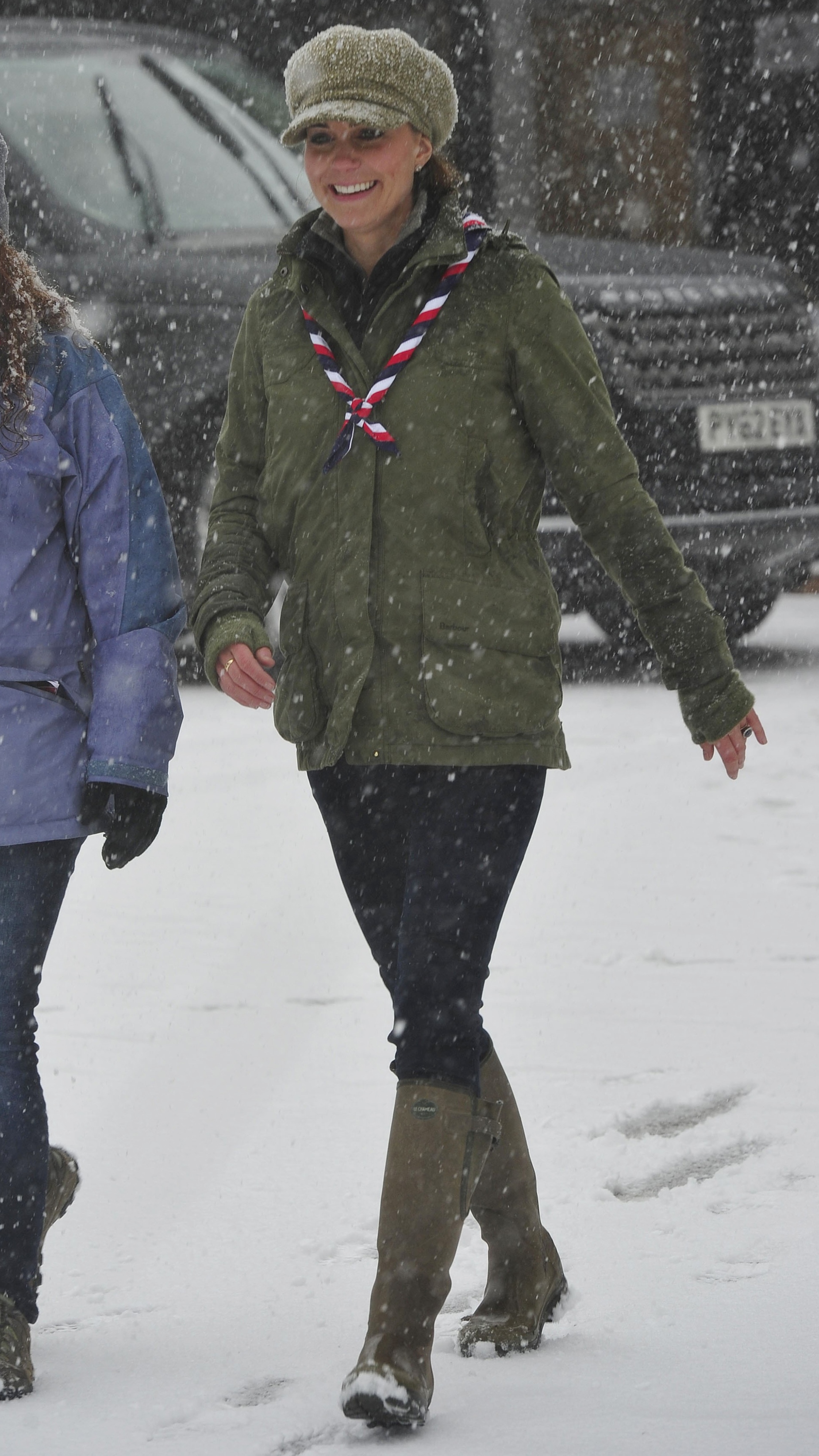 Catherine, Princess of Wales smiles as arrives in the snow for a visit to the Great Tower Scout camp at Newby Bridge in Cumbria on March 22, 2013.