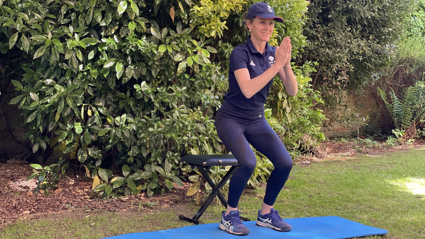 Chair squat exercise for horse rider strengthening