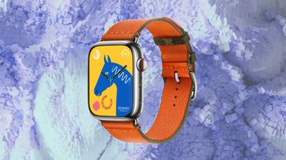Apple Watch Series 9 Hermes Edition against purple background