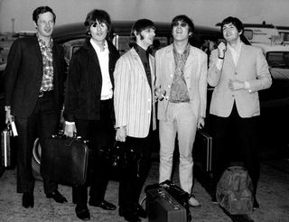 The Beatles with manager Brian Epstein