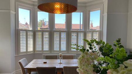 Shuttercraft shutters in dining room