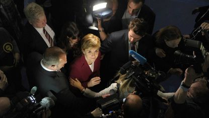 Nicola Sturgeon surrounded by media