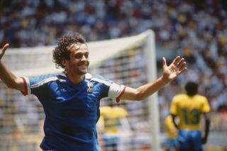 Michel Platini celebrates after scoring for France against Brazil at the 1986 World Cup.