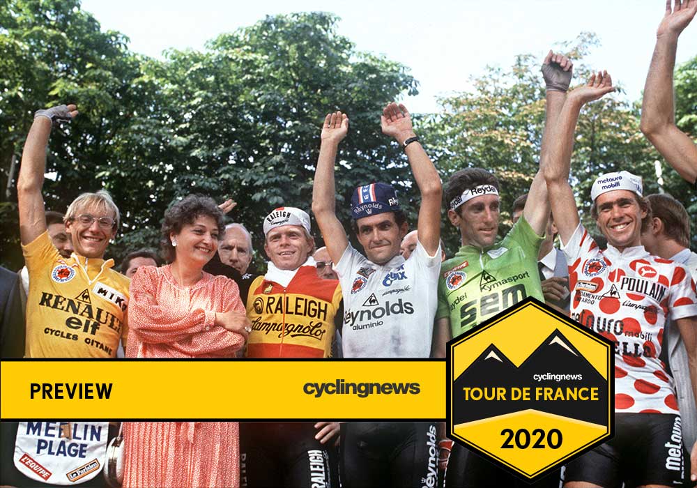 The 1983 Tour de France podium: Laurent Fignon in yellow, Sean Kelly in green