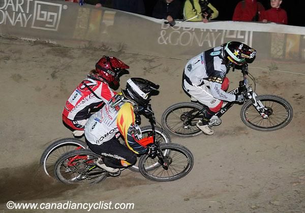 Riders stack up in a corner.