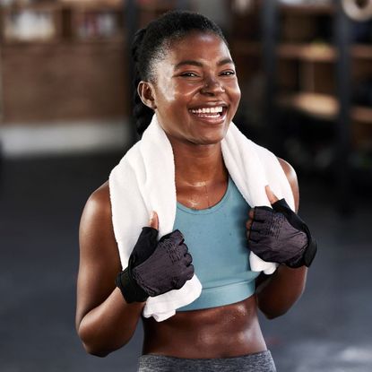 Gym workouts: A woman sweating after a gym workout