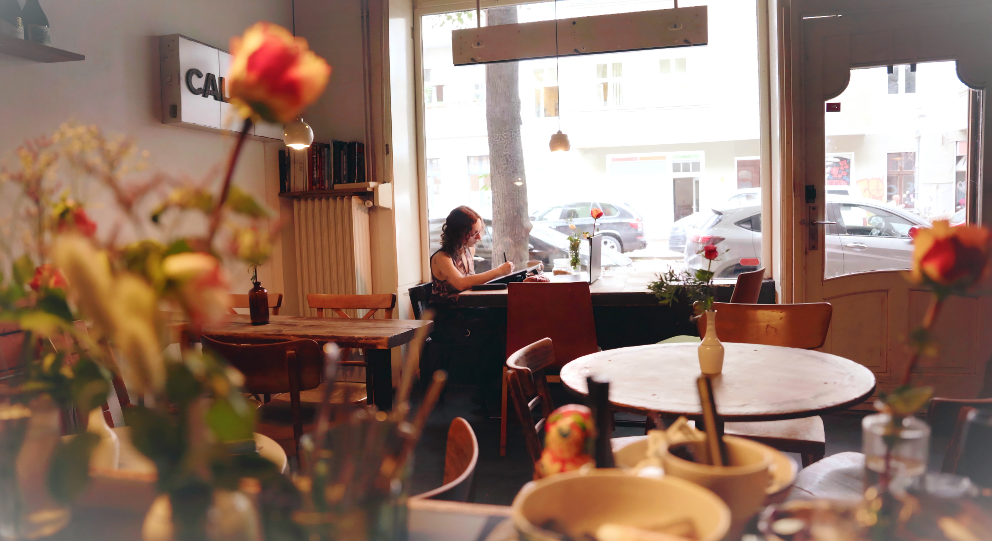 Giusy Amoroso using XPPen Artist Ultra 16 in a cafe