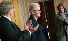 Gina McCarthy (center) is applauded during President Obama's nomination ceremony for EPA Administrator. 