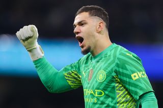 Ederson celebrates during Manchester City's game against Brentford in February 2024.