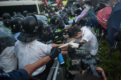 Police blast Hong Kong pro-democracy demonstrators with tear gas