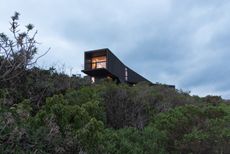 Casa Asomada by Whale!, a chilean house jutting out from a cliff towards the landscape 