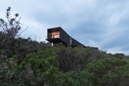 Casa Asomada by Whale!, a chilean house jutting out from a cliff towards the landscape