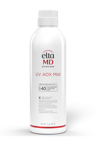 A bottle of EltaMD UV Aox Mist sunscreen against a white background.