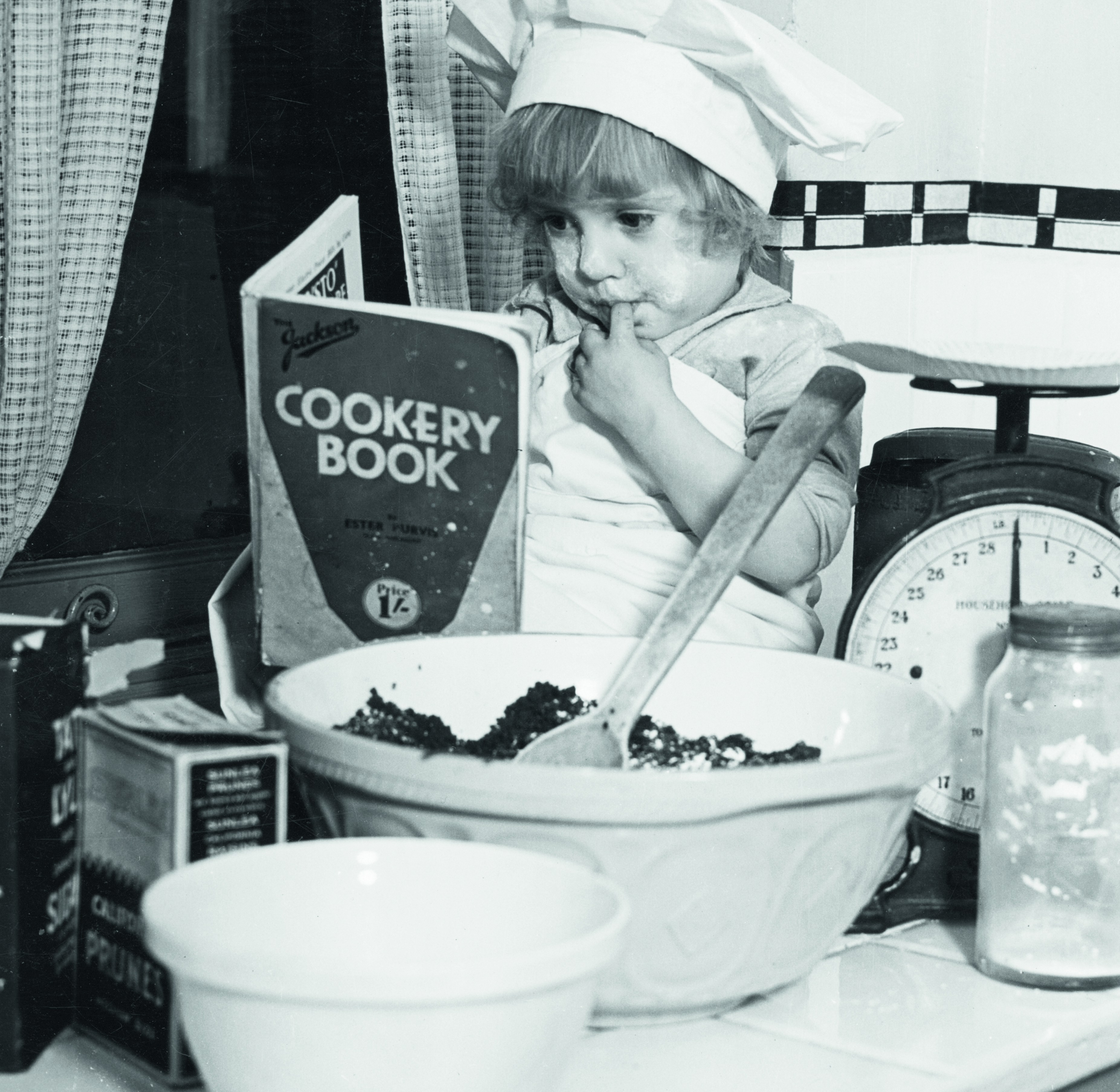 The English Christmas Pudding is a science in itself as this young would be cook is discovering in the 1930s.