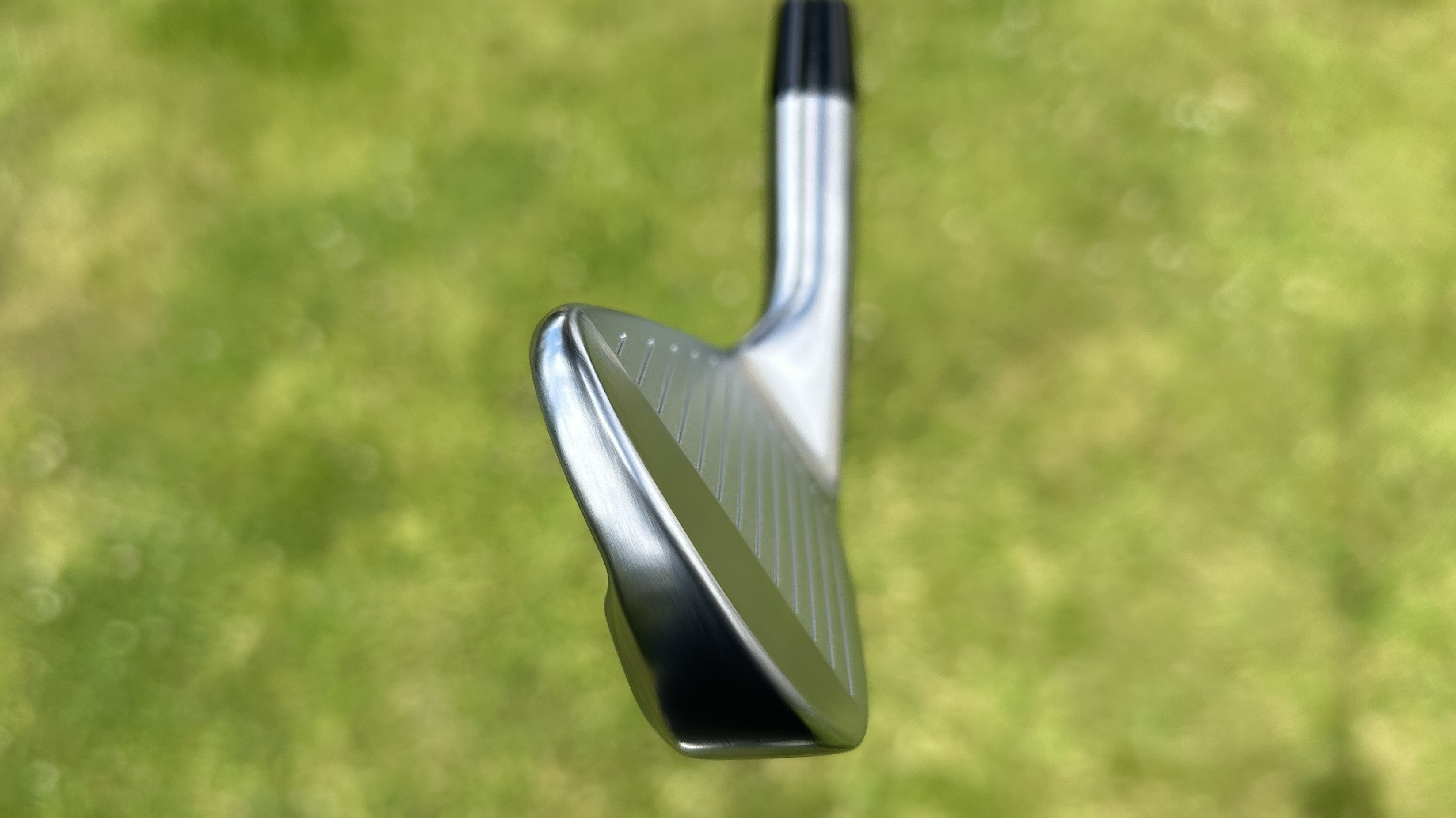 Photo of the Titleist 2025 T100 Iron from the toe angle