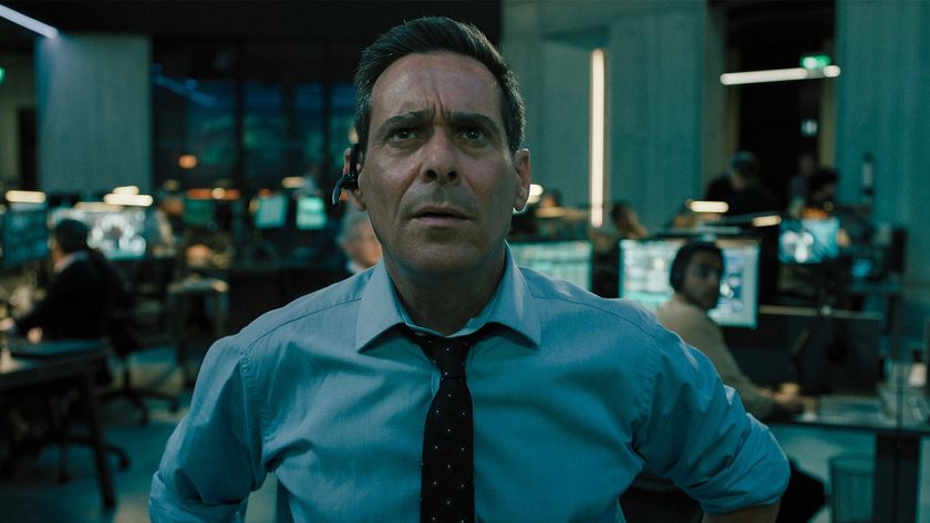 James Callis looks confused while standing in a room filled with computers in Slow Horses season 5 episode 5