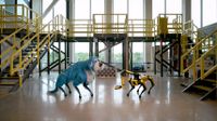 A screenshot form a YouTUbe video showing Boston Dynamics' Sparkles, essentially a Boston Dynamics' Spot dressed up in a silly blue dog costume