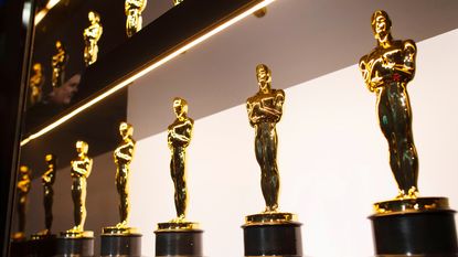 How did these little statues become known as the Oscars?