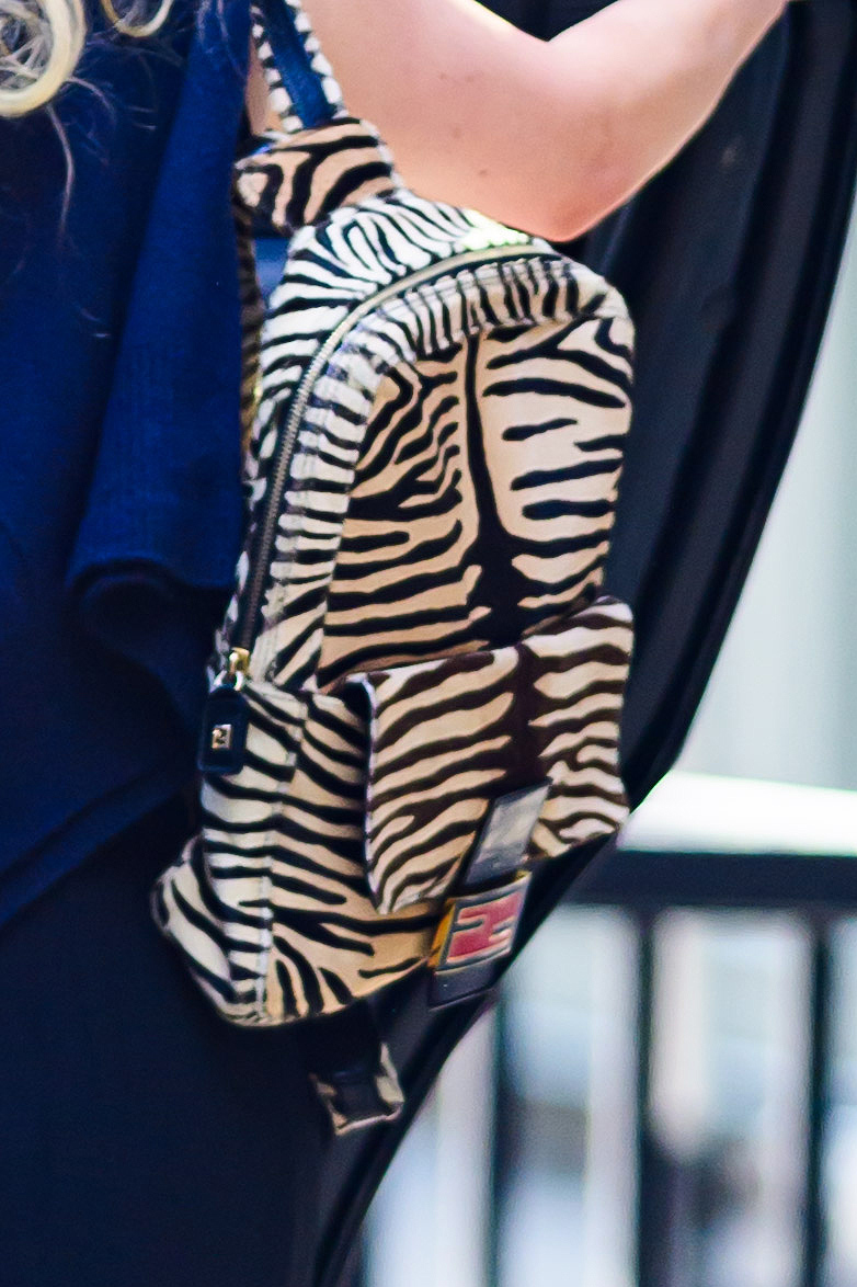 Jennifer Lawrence carrying a vintage Fendi tiger print mini backpack