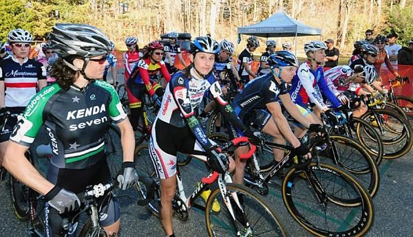 The elite women's front row gets final instructions from the officials
