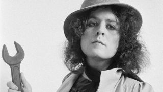 Marc Bolan holding a spanner