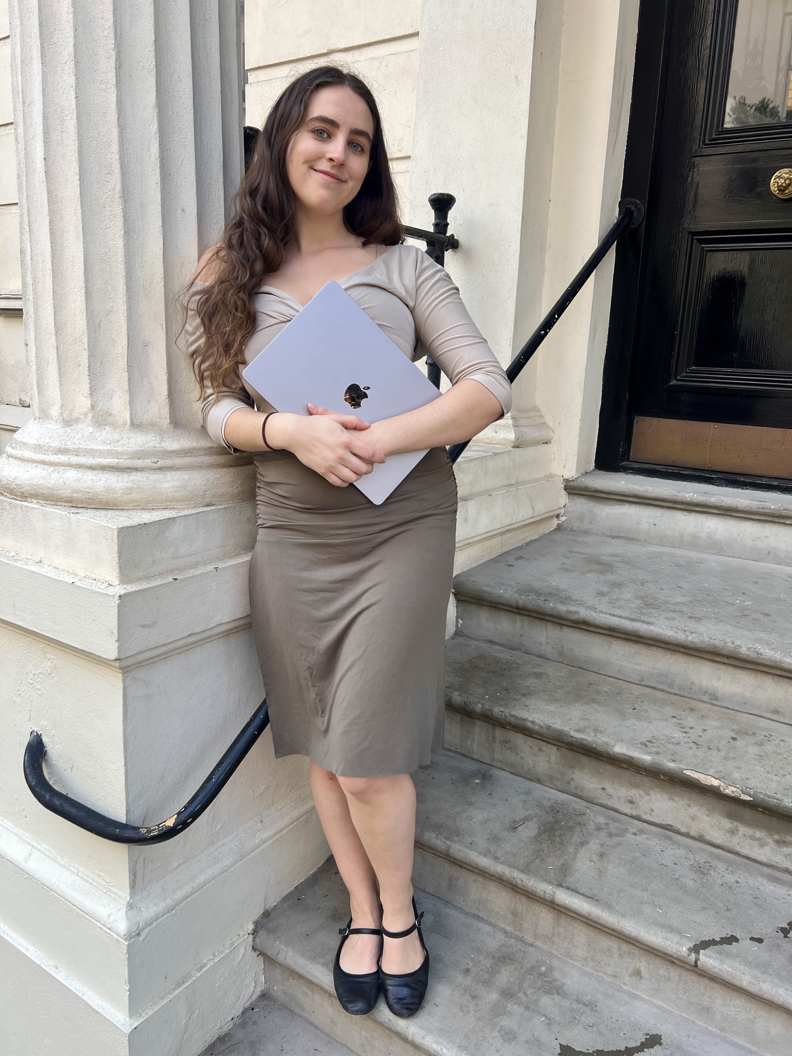 An image of @avahgilchrist wearing With Jean's Lana Top and Lila Skirt, one of the biggest office wear trends of 2026.