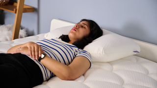 TG bedding writer sleeping on the Purple GridCloud Pillow while testing it in TG Sleep Studio