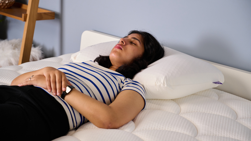 TG bedding writer sleeping on the Purple GridCloud Pillow while testing it in TG Sleep Studio