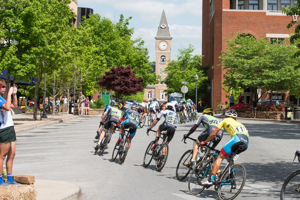 Janier Acevado at the back as the peloton corners