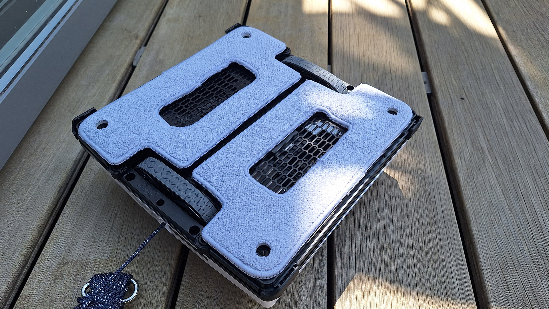 Hobot S7 Pro window cleaning robot flipped upside down to show mop pads