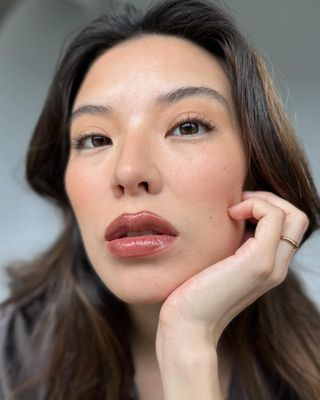 A woman wearing a nude eyeshadow look