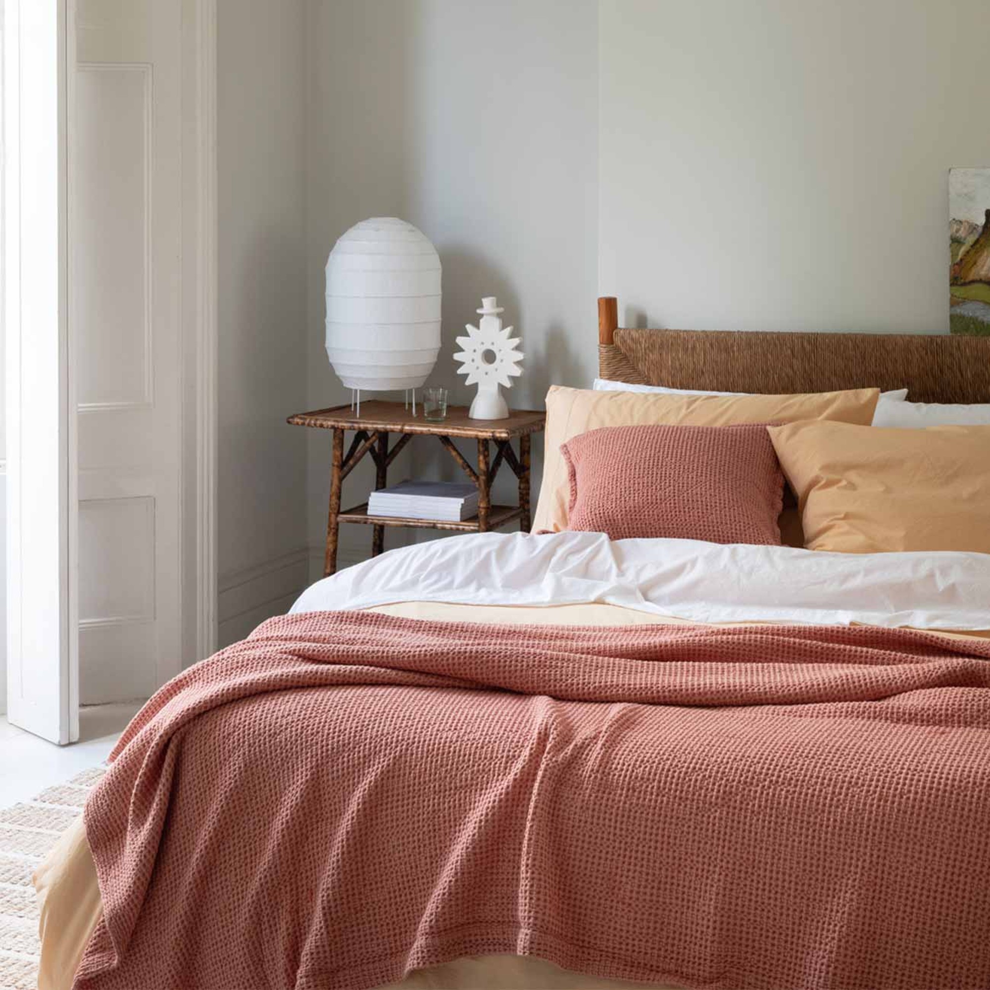 Waffle duvet cover set in warm pink tones in bedroom