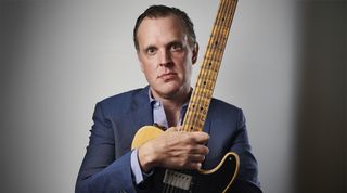 A photo of Joe Bonamassa holding a Fender Nocaster
