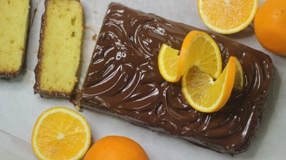 jaffa cakes cake with orange sponge and chocolate ganache on a board