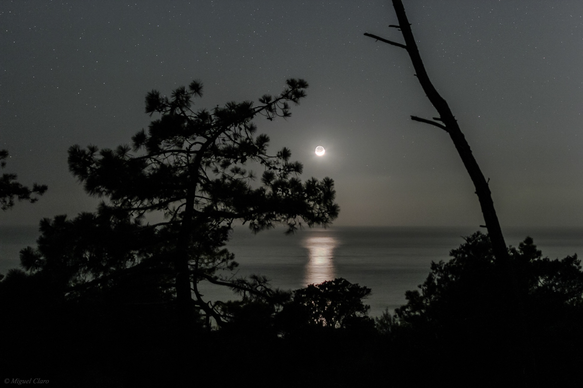 Moonset Off Portuguese Coast by Miguel Claro