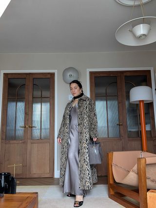 Hannah Almassi wears the Rixo Milly coat