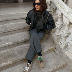 Debora wearing brown trainers