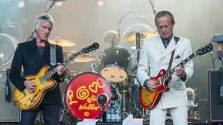 Paul Weller and Steve Cradock perform on stage at Warwick Castle on July 11, 2014 in Warwick, United Kingdom.