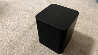 Amazon Fire TV Soundbar Plus subwoofer on rug