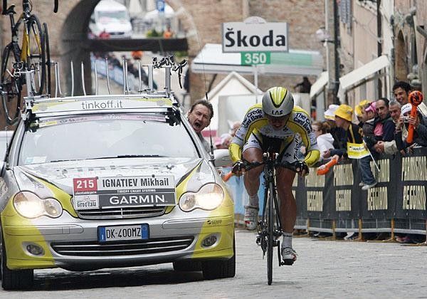 Mikhail Ignatiev (Tinkoff) gets some encouragement from the team car.