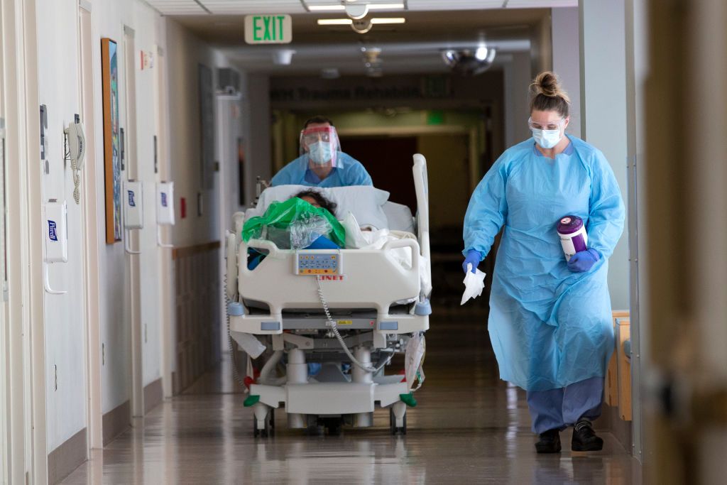 Doctors with a coronavirus patient inside a Seattle hospital.